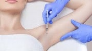 Injection in a women's armpit